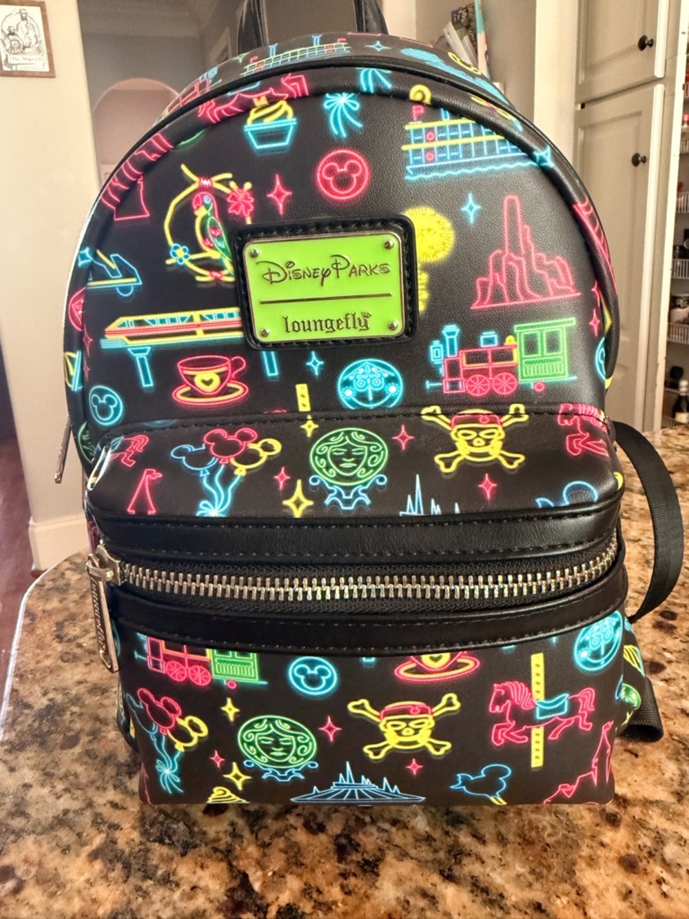 Loungefly Black Mini Backpack with Neon Multicolor Disney Icons
